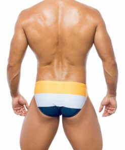 Photo of men's swimsuit, brief model, frontview. Briefs with a pattern of three horizontal bands in yellow tending towards ocher, off-white, blue